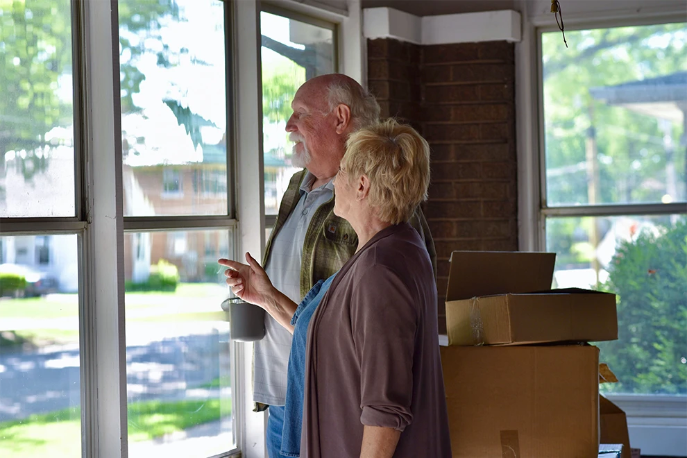Older couple preparing to downsize for retirement